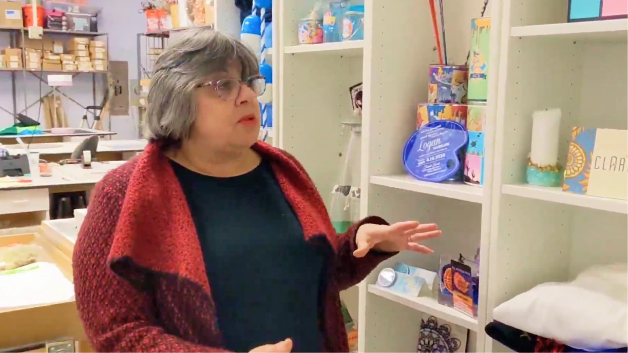 Heidi Hiller of Innovative Party Planners in her warehouse surrounded by curated event decor and rental inventory, representing 29 years of boutique event business expertise