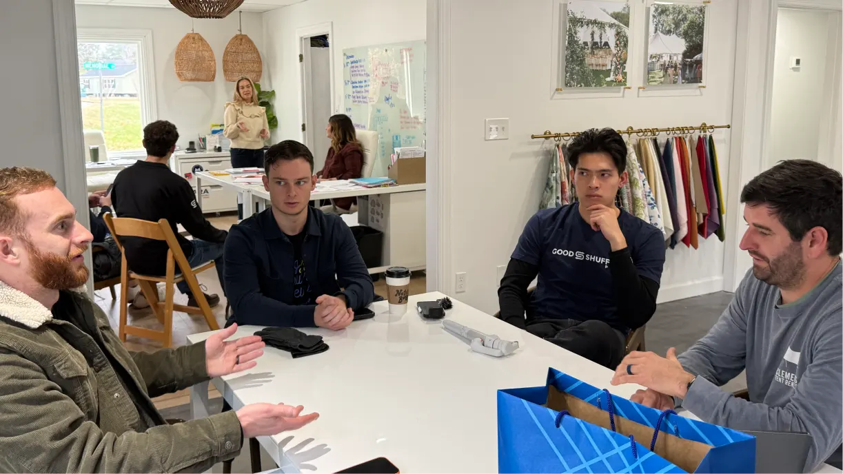 Goodshuffle Pro team members touring event rental warehouse and meeting with business owners